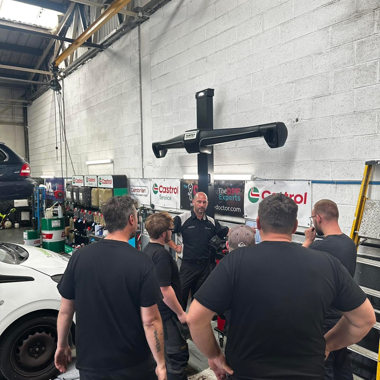 Shaw's Service Station team training on Hunter four wheel alignment equipment