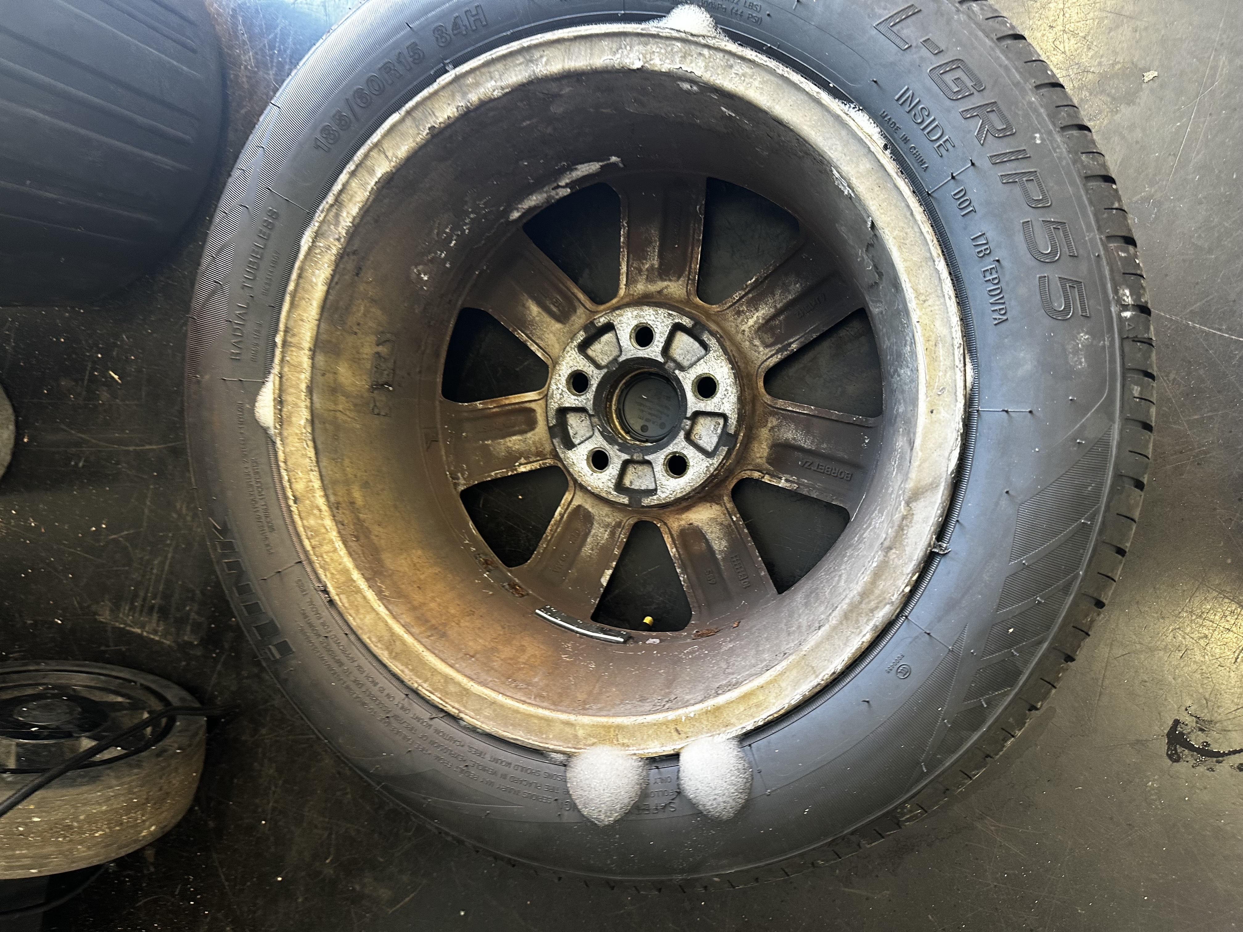 Diagnostic fault showing no communication with a left front TPMS wheel sensor at Shaw's Service Station