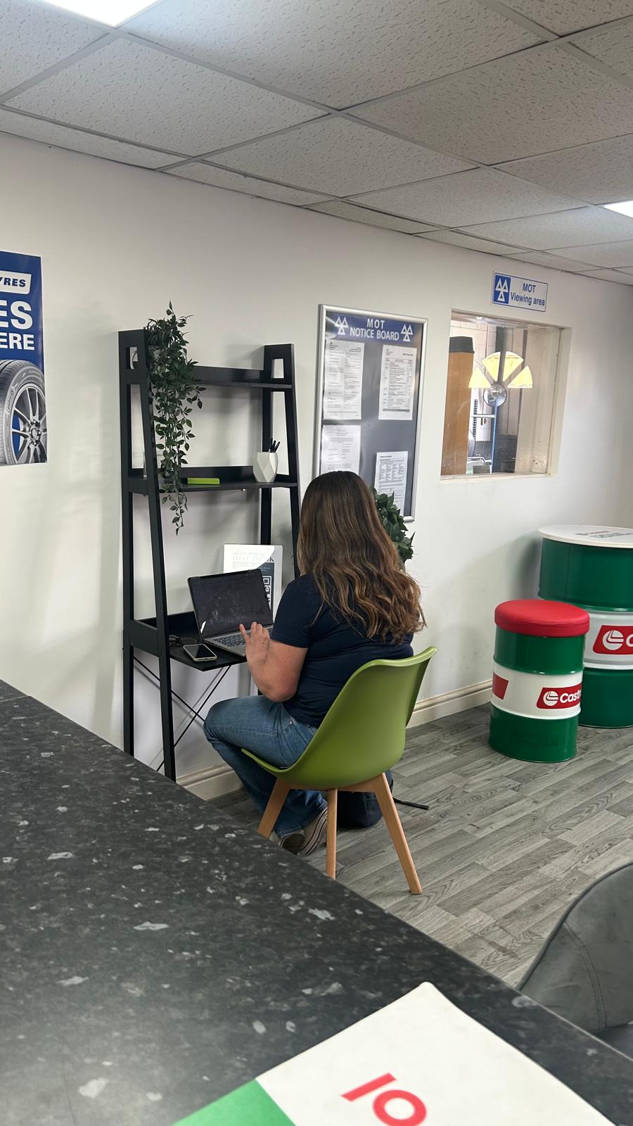 Shaw's Service Station customer waiting area with MOT viewing window