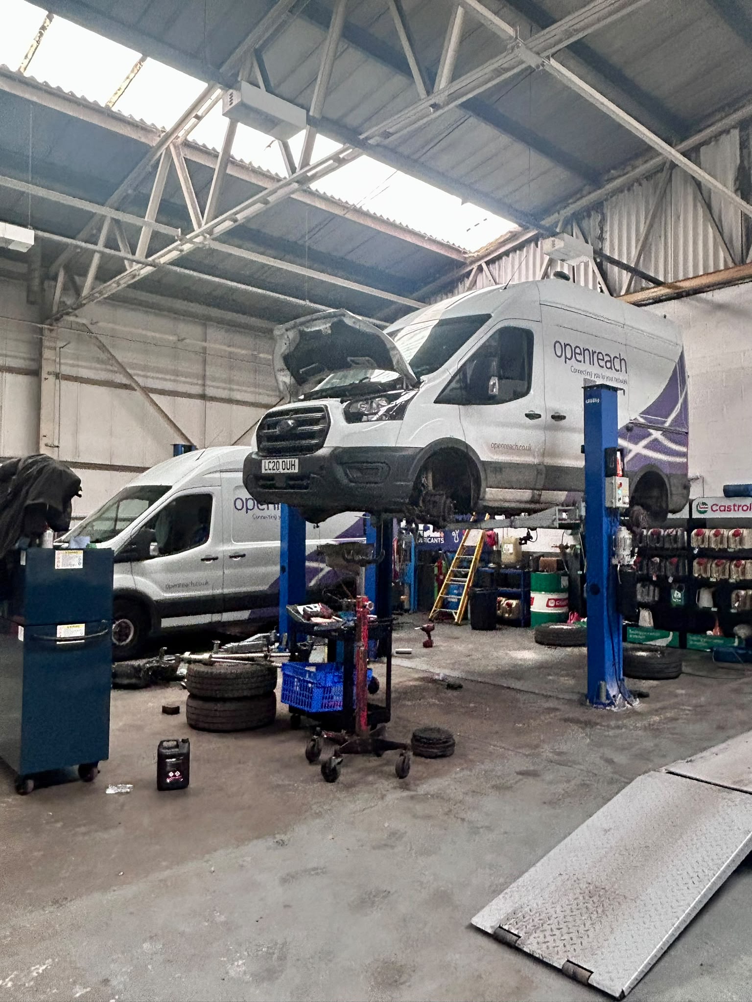 BT commercial van on a workshop ramp at Shaw's Service Station Rhyl