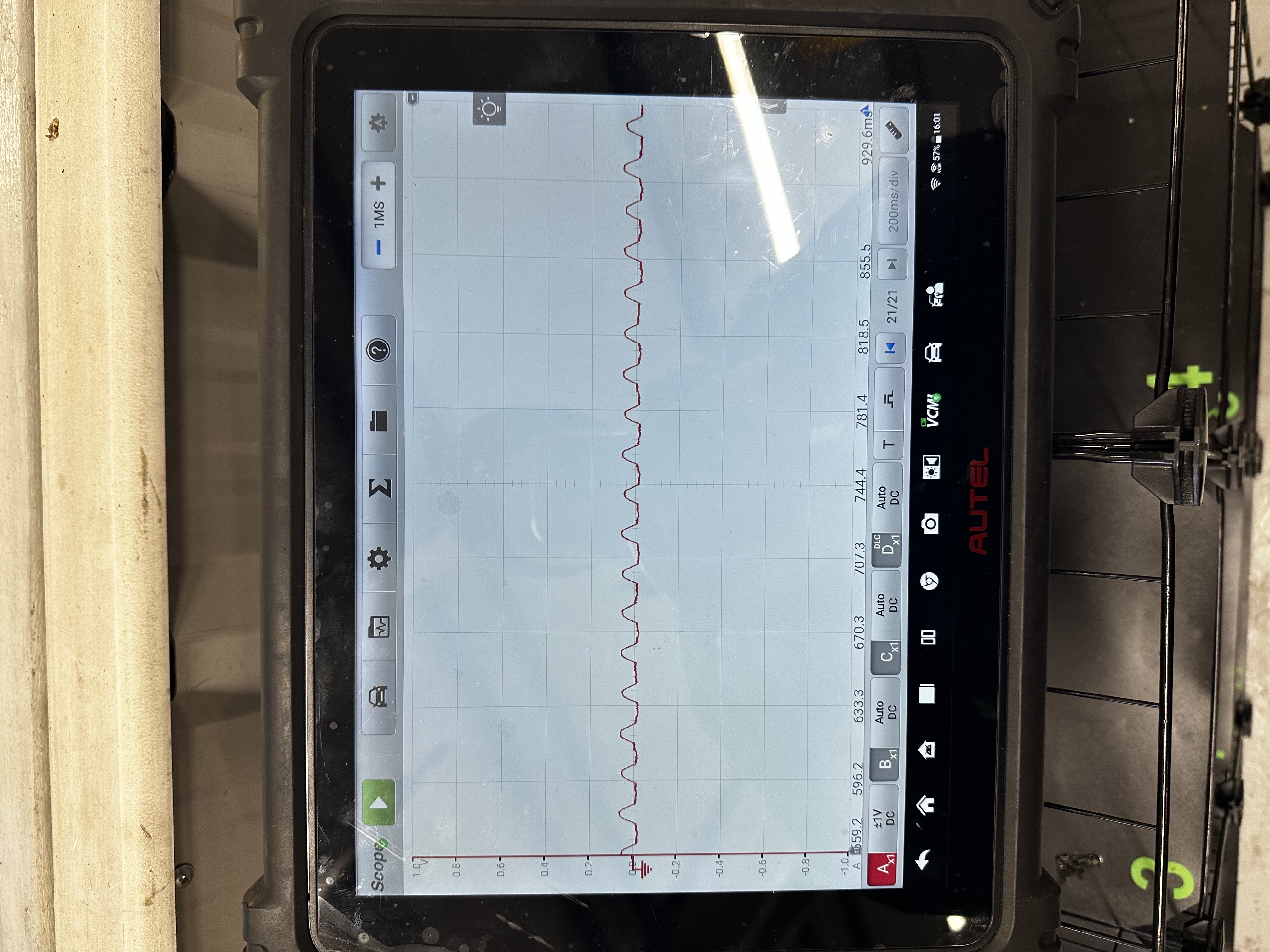 Autel automotive diagnostic tablet in oscilloscope mode measuring a live sensor signal at Shaw's Service Station