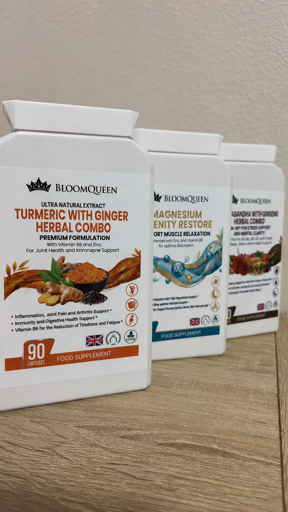BloomQueen Recovery Bundle — three supplement bottles arranged on a rolled yoga mat beside a glass water bottle