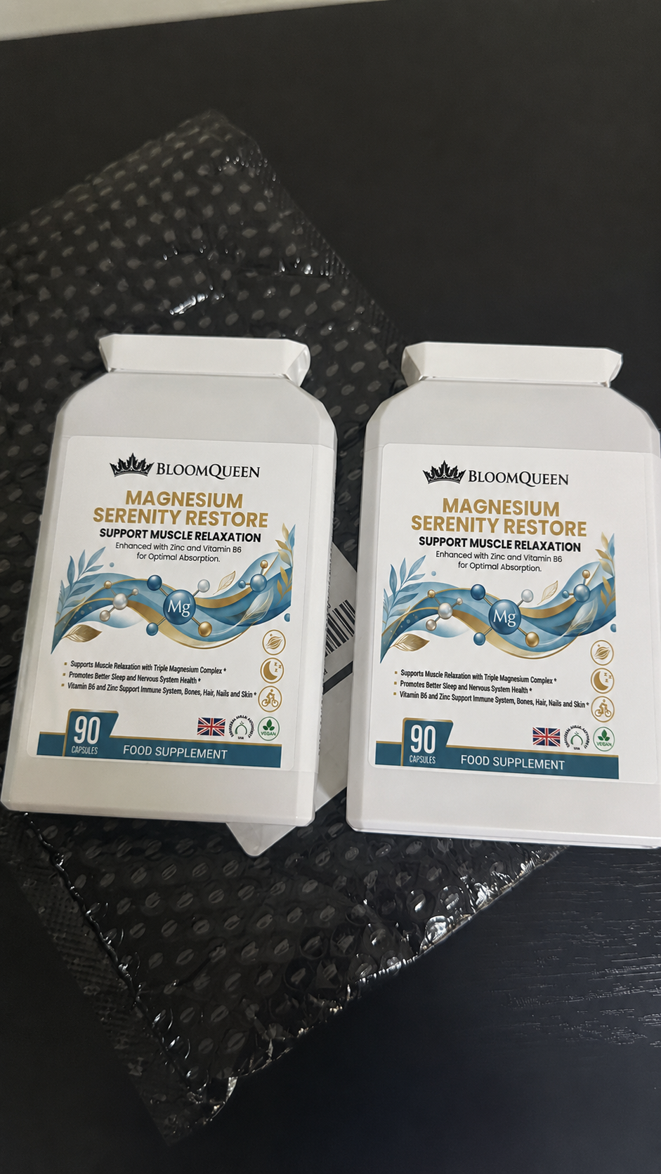 Two bottles just delivered, side by side