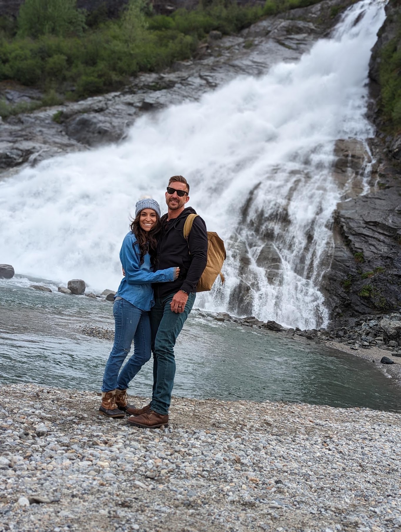 Trevor and Bridgett Dunbar together near a waterfall
