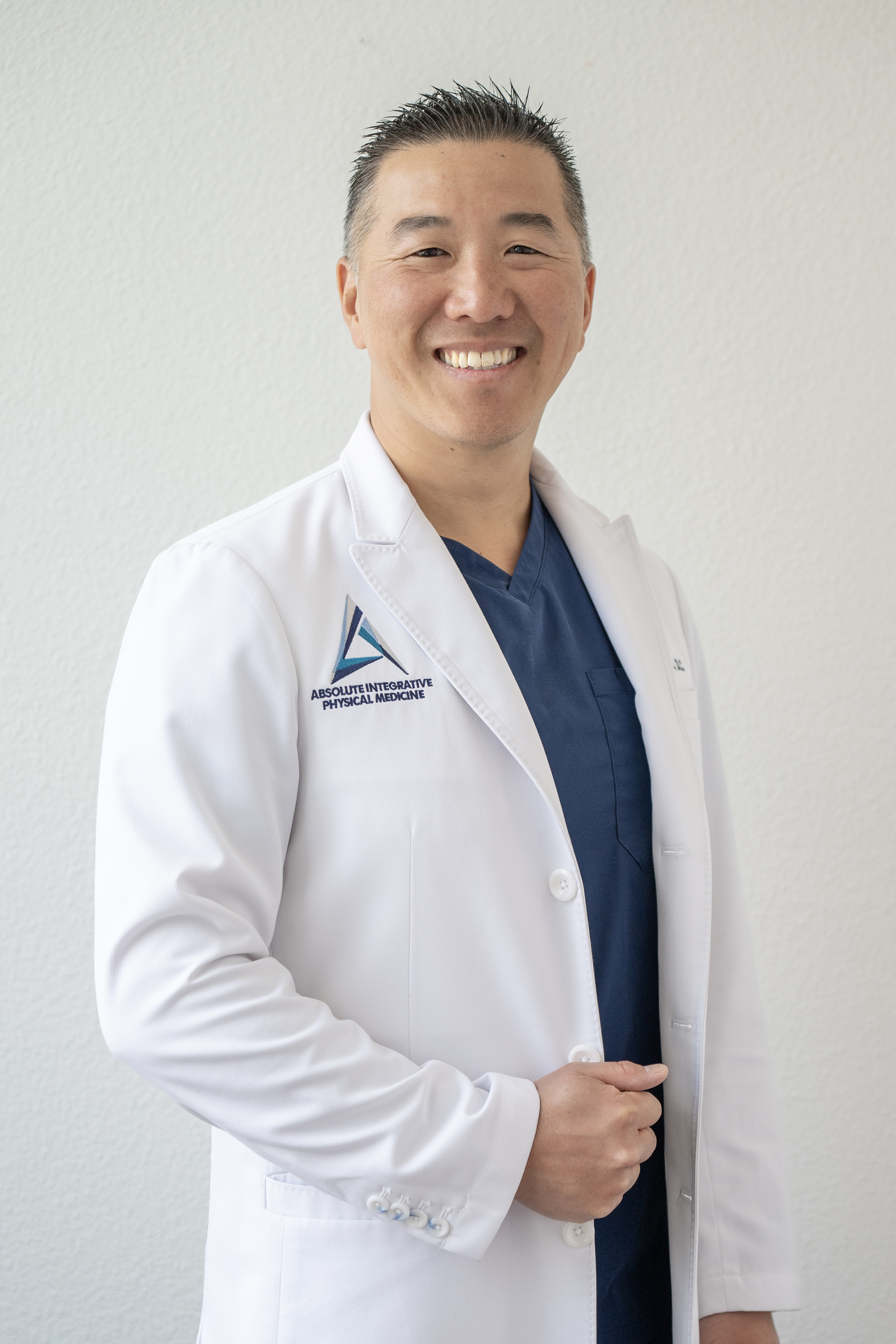 Dr. Alex Tam D.C