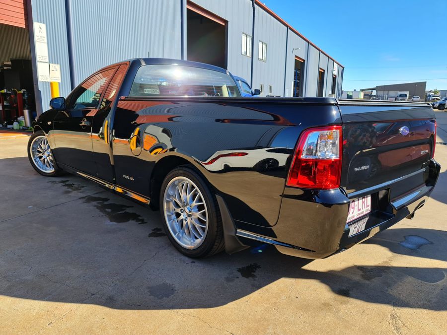 Black Ford Falcon XR6 ute with deep gloss