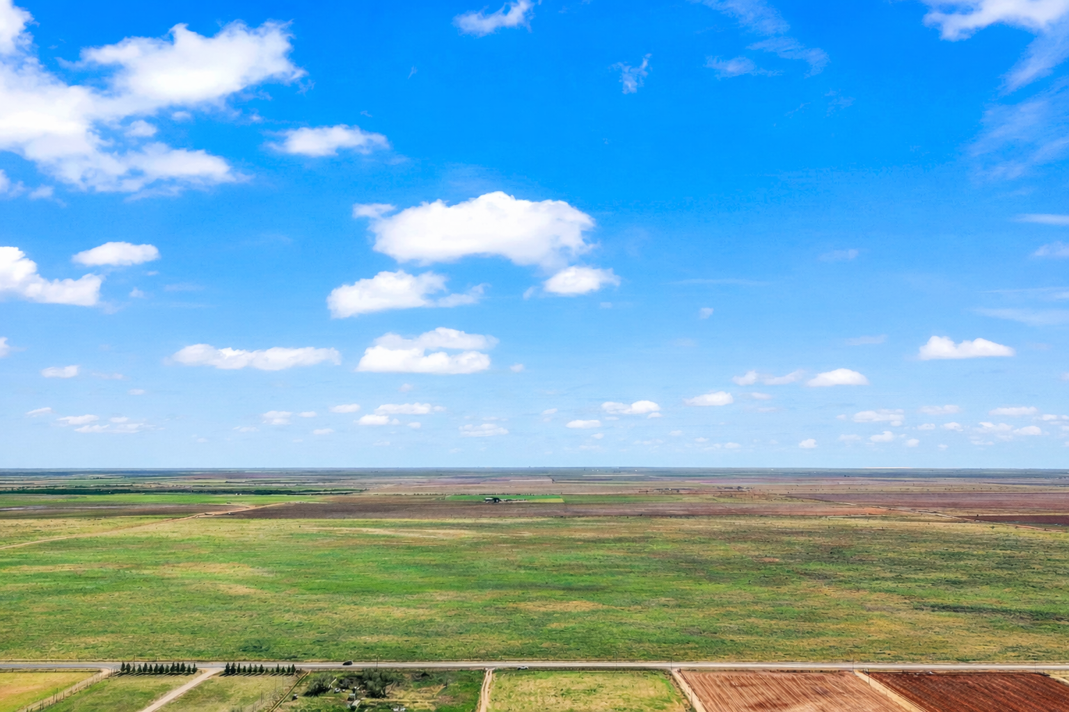 Aerial view of open farmland and pasture near Brownfield, Texas