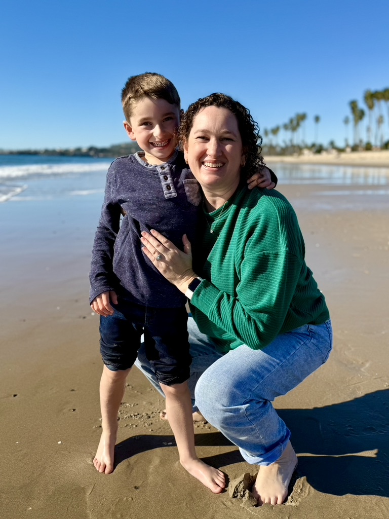 Kelly and her son at the beach