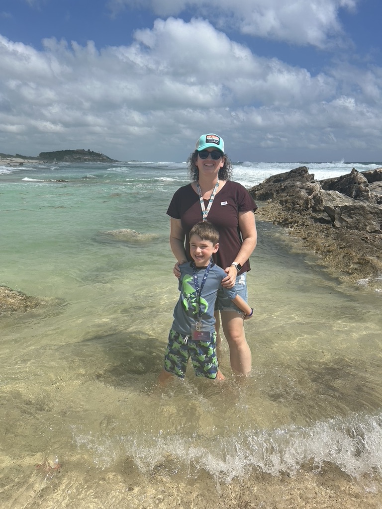 Kelly and her son in the ocean