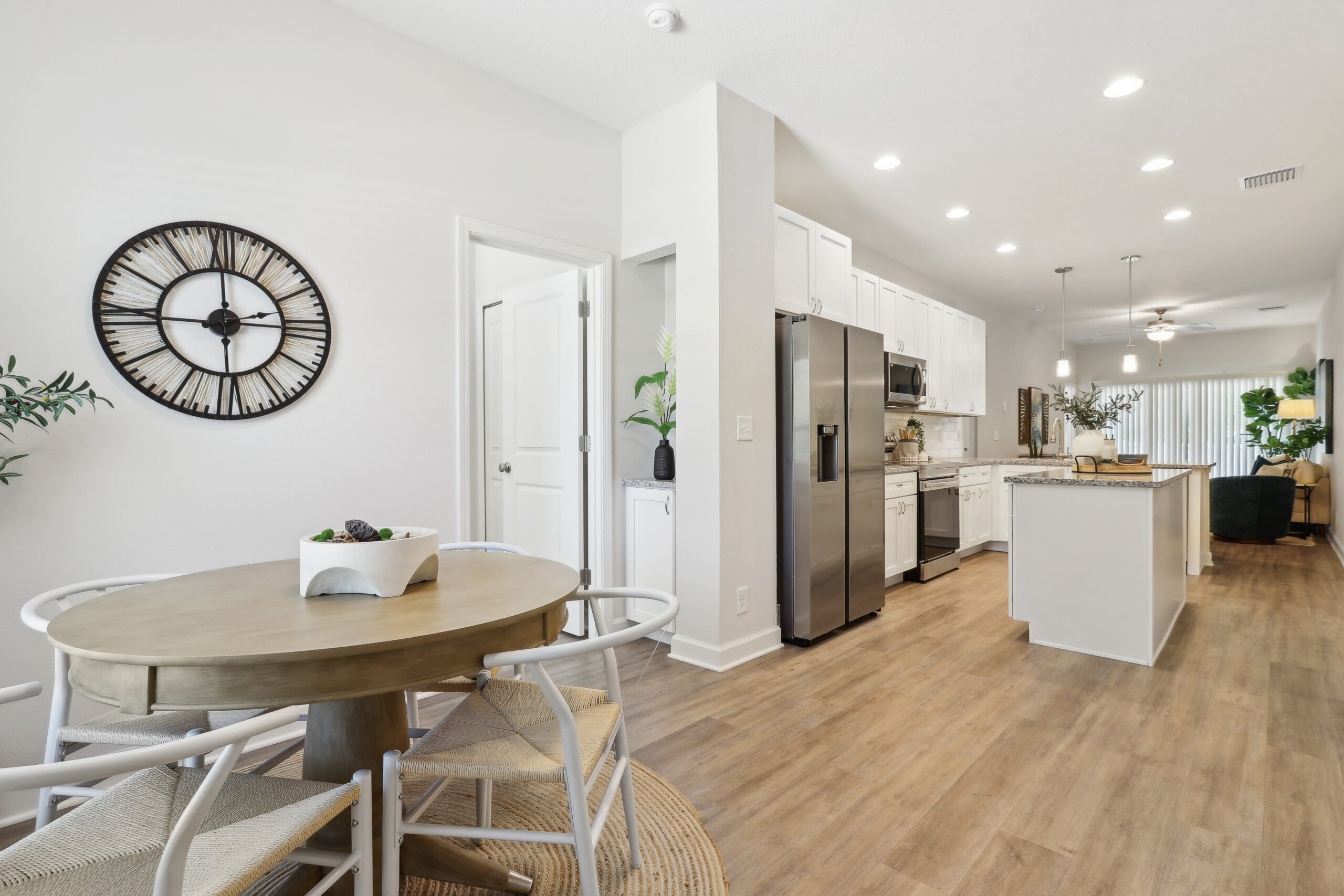 Open dining, kitchen, and living area