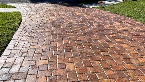 Freshly sealed paver driveway