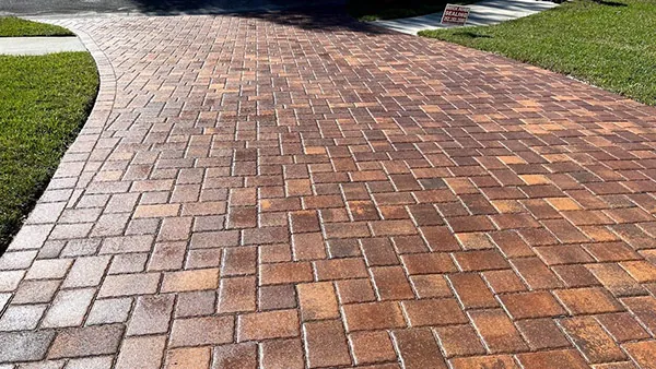 Freshly sealed paver driveway