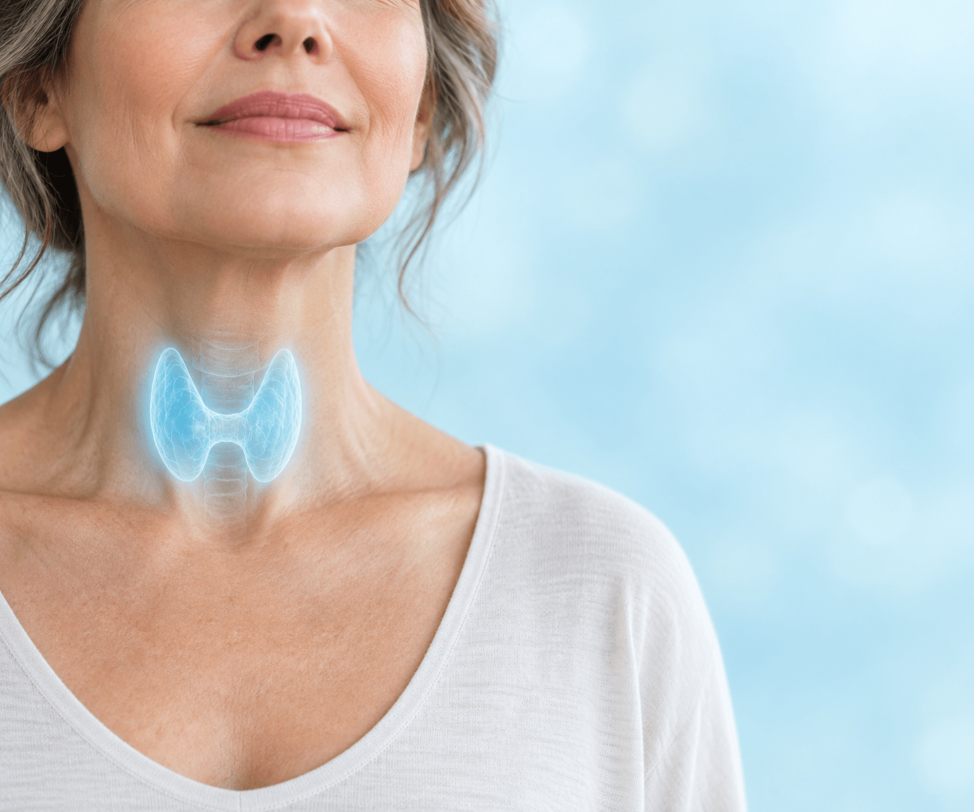 Thyroid wellness portrait with butterfly glow