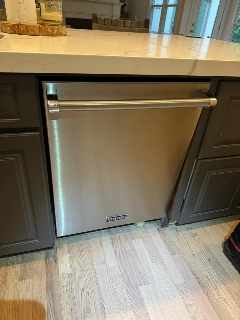 Viking dishwasher secured in its cabinet opening
