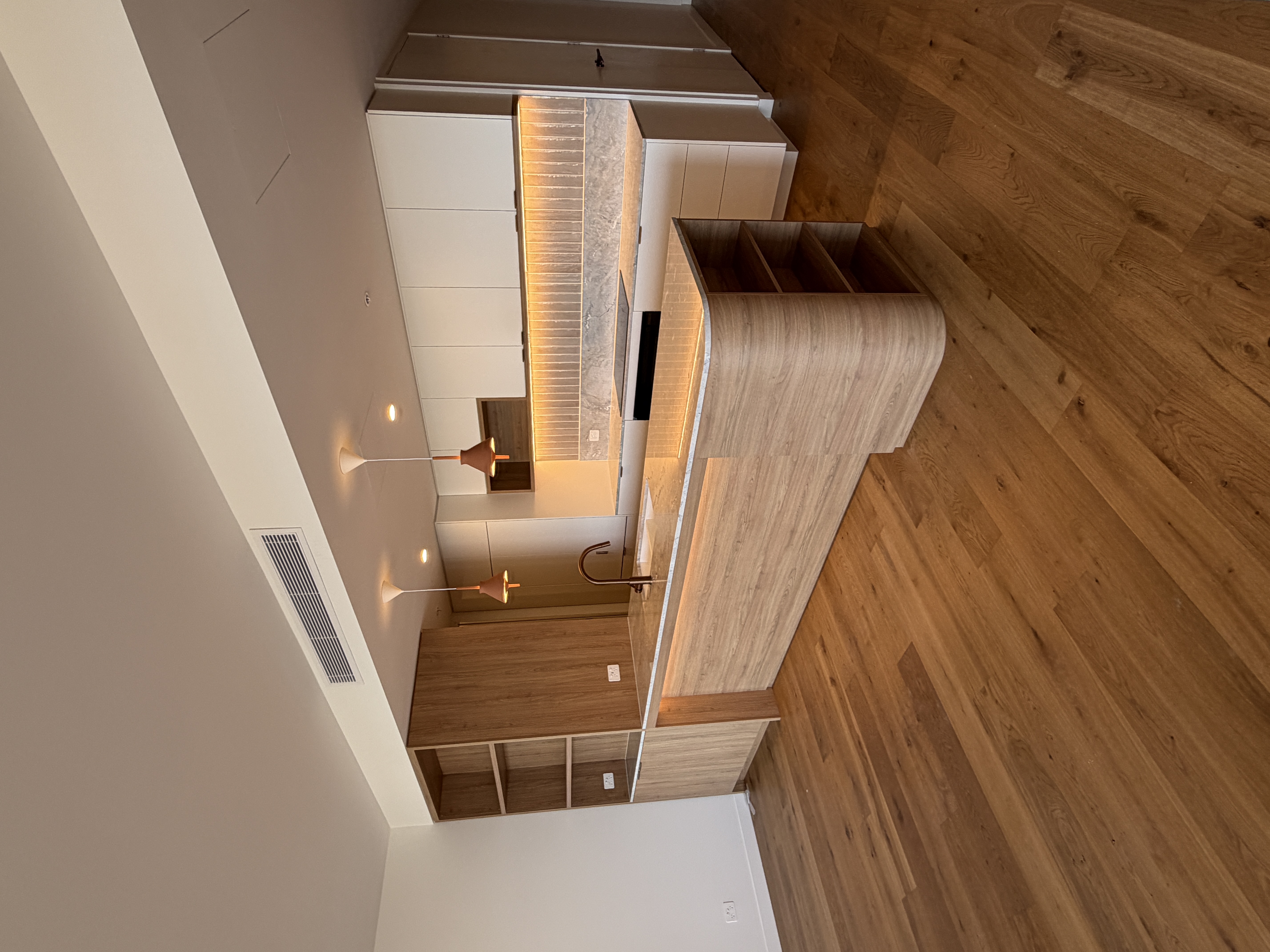 Wide-plank engineered timber flooring installed in a modern kitchen