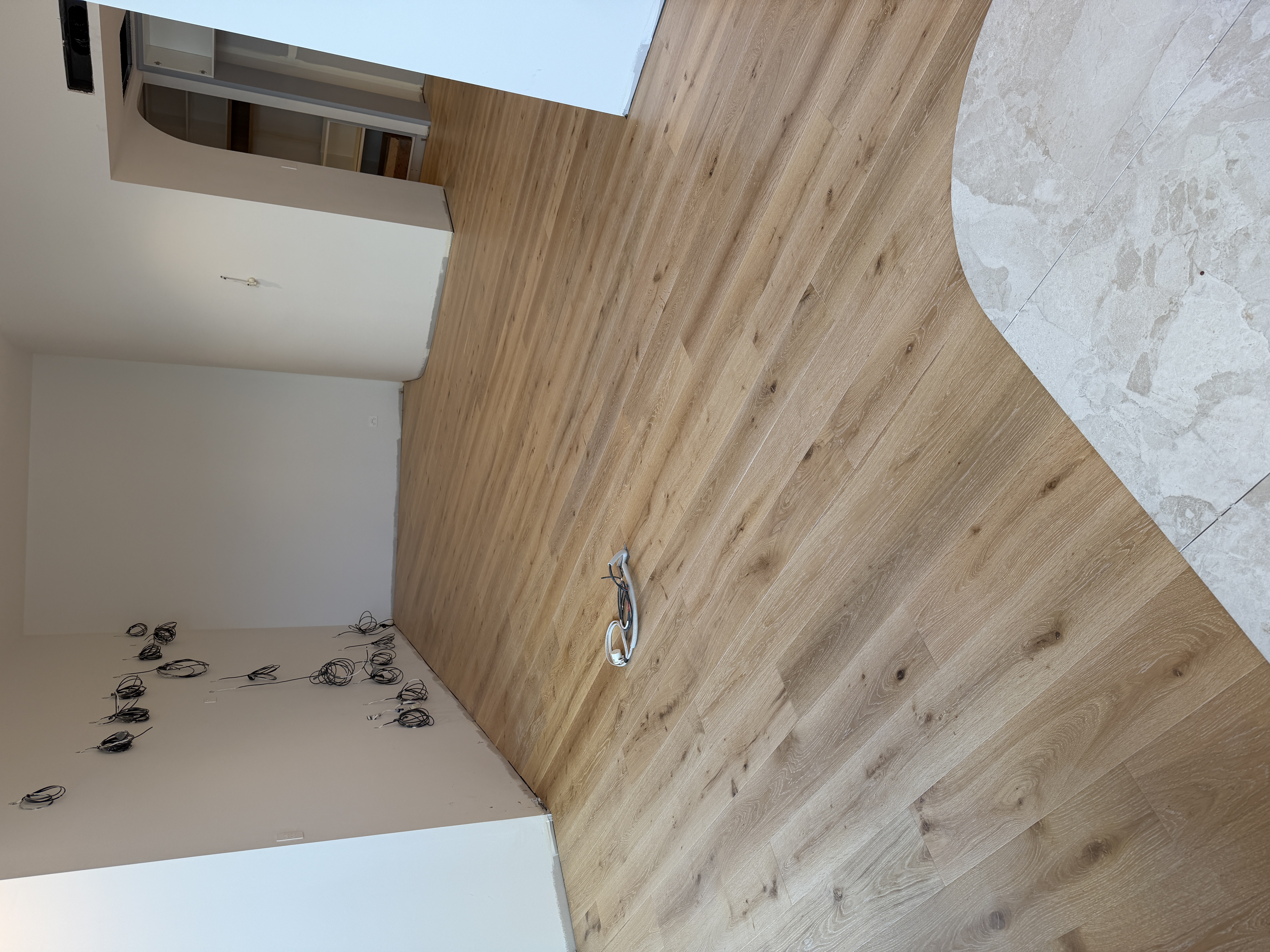 Kirra apartment after flooring, wide-plank engineered timber