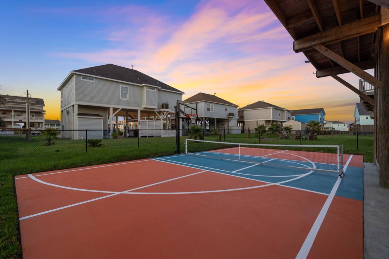 Private pickleball court that flips to basketball