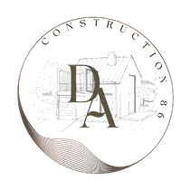 Un logo circulaire pour DA Construction 86, représentant une maison stylisée et des arbres avec des superpositions d’initiales.