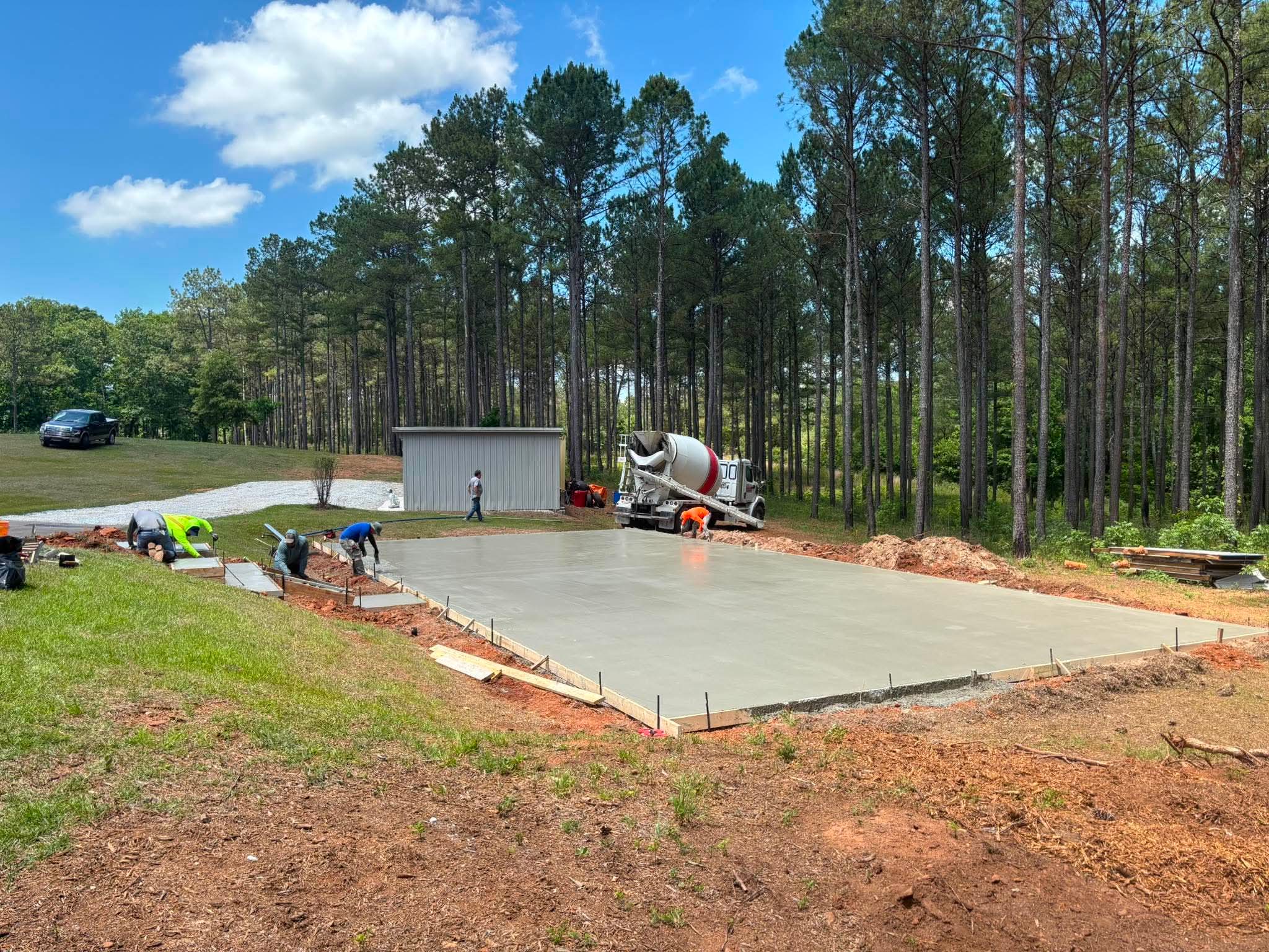 Large concrete slab being poured for a residential project