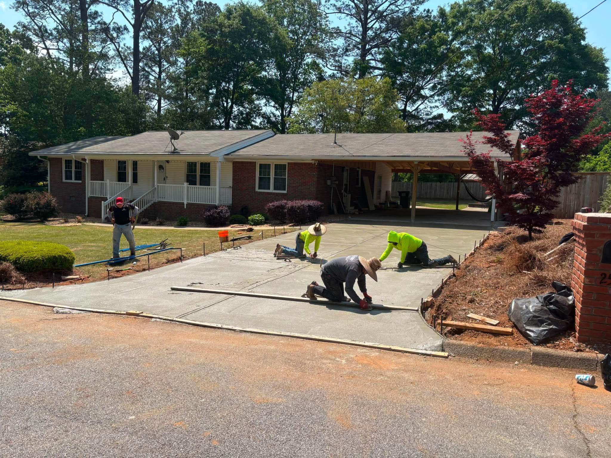 Concrete driveway work in progress by Gomez Concrete Service
