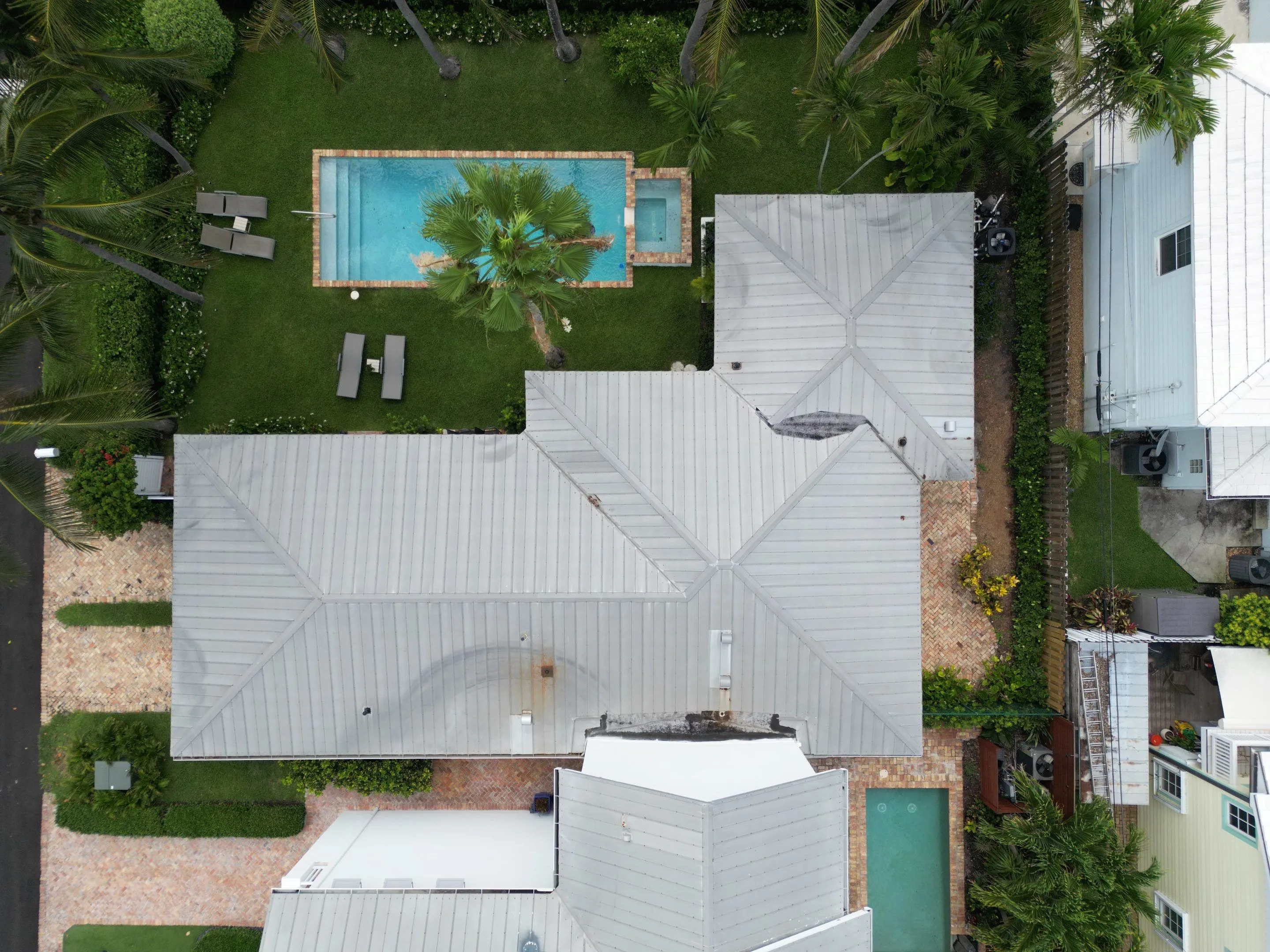 Metal roof repair by Aastro Roofing in South Florida