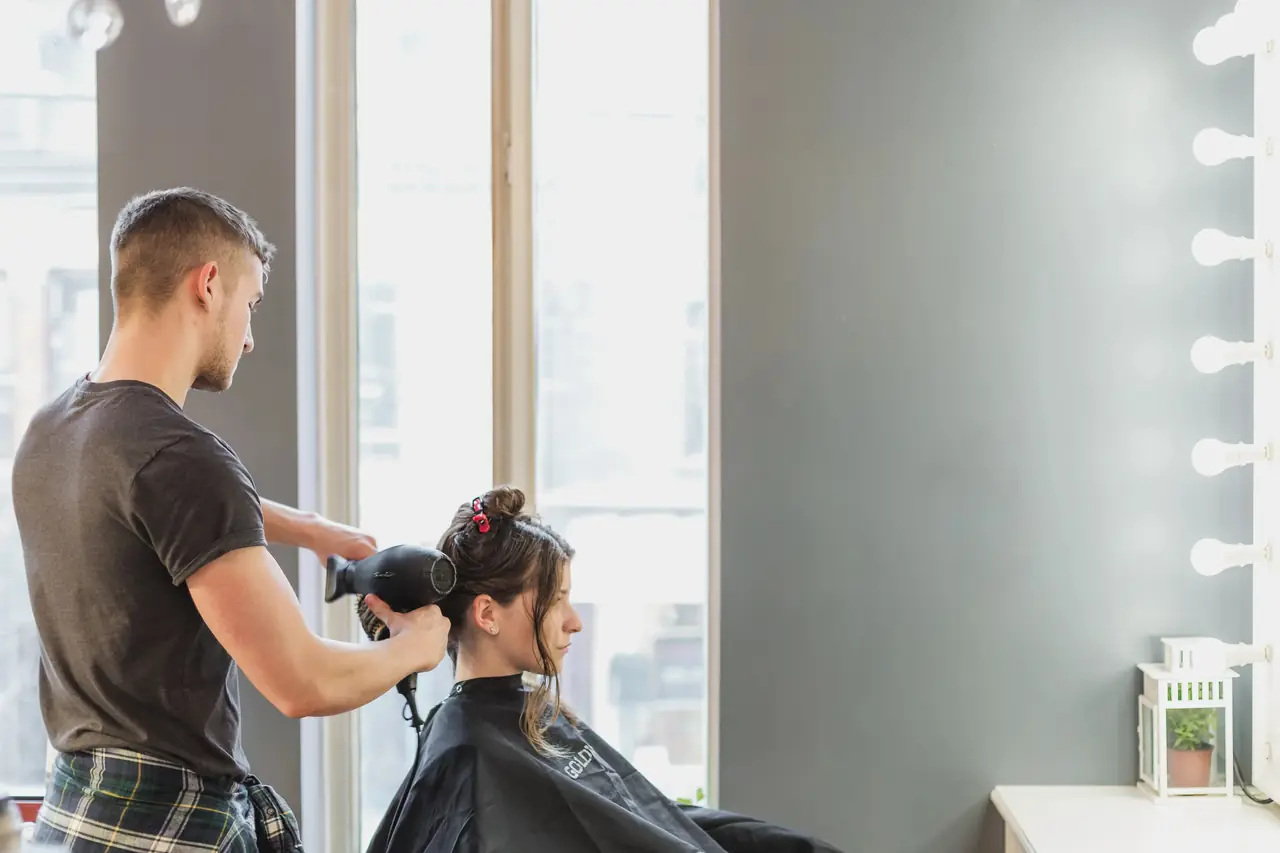 Stylist cutting hair at Hair 2000 in San Rafael