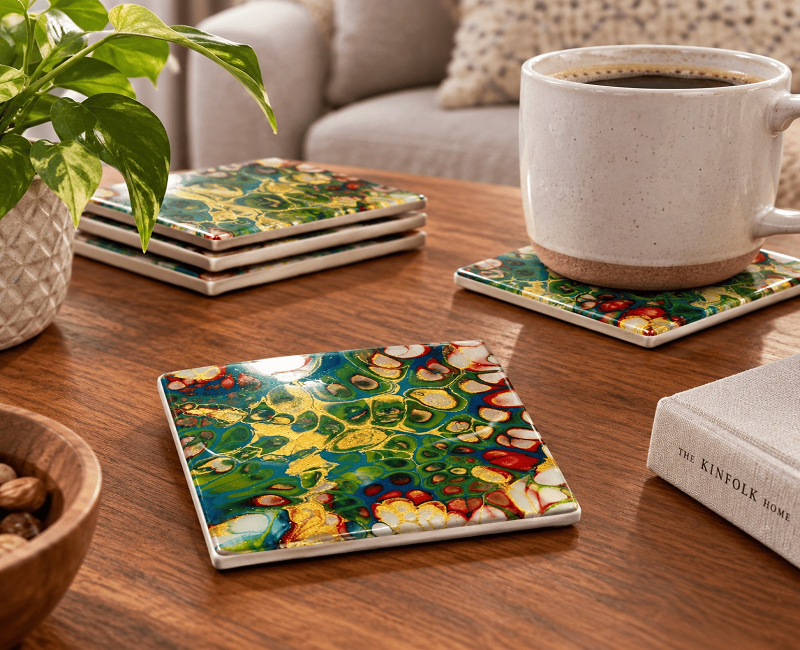 Art by Robbie ceramic coaster styled on a coffee table
