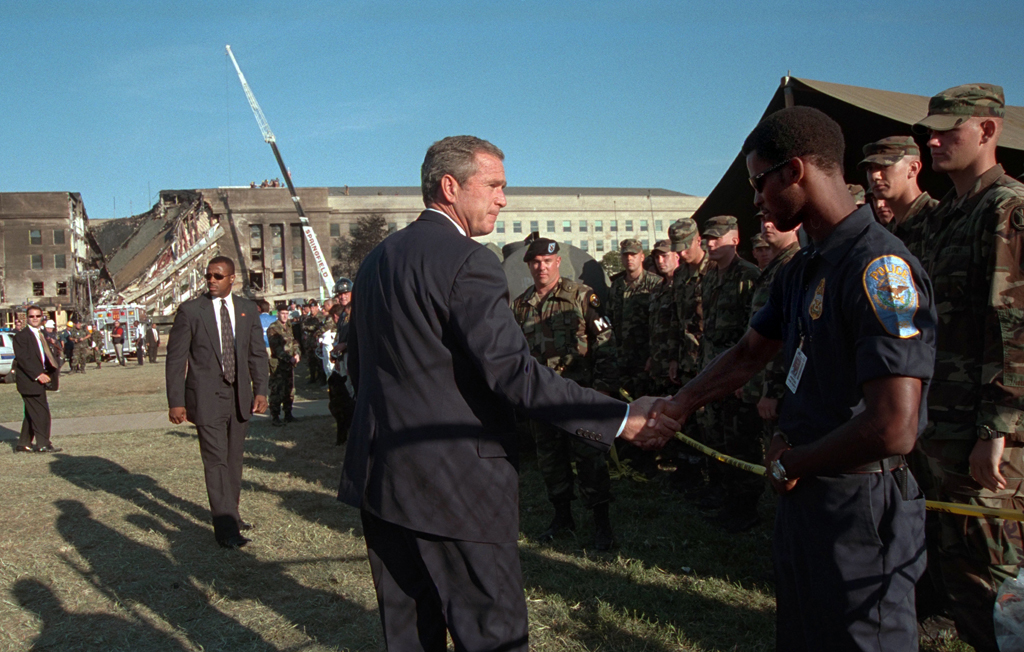 President George W. Bush with Jesse Johnson-Brower's Army unit