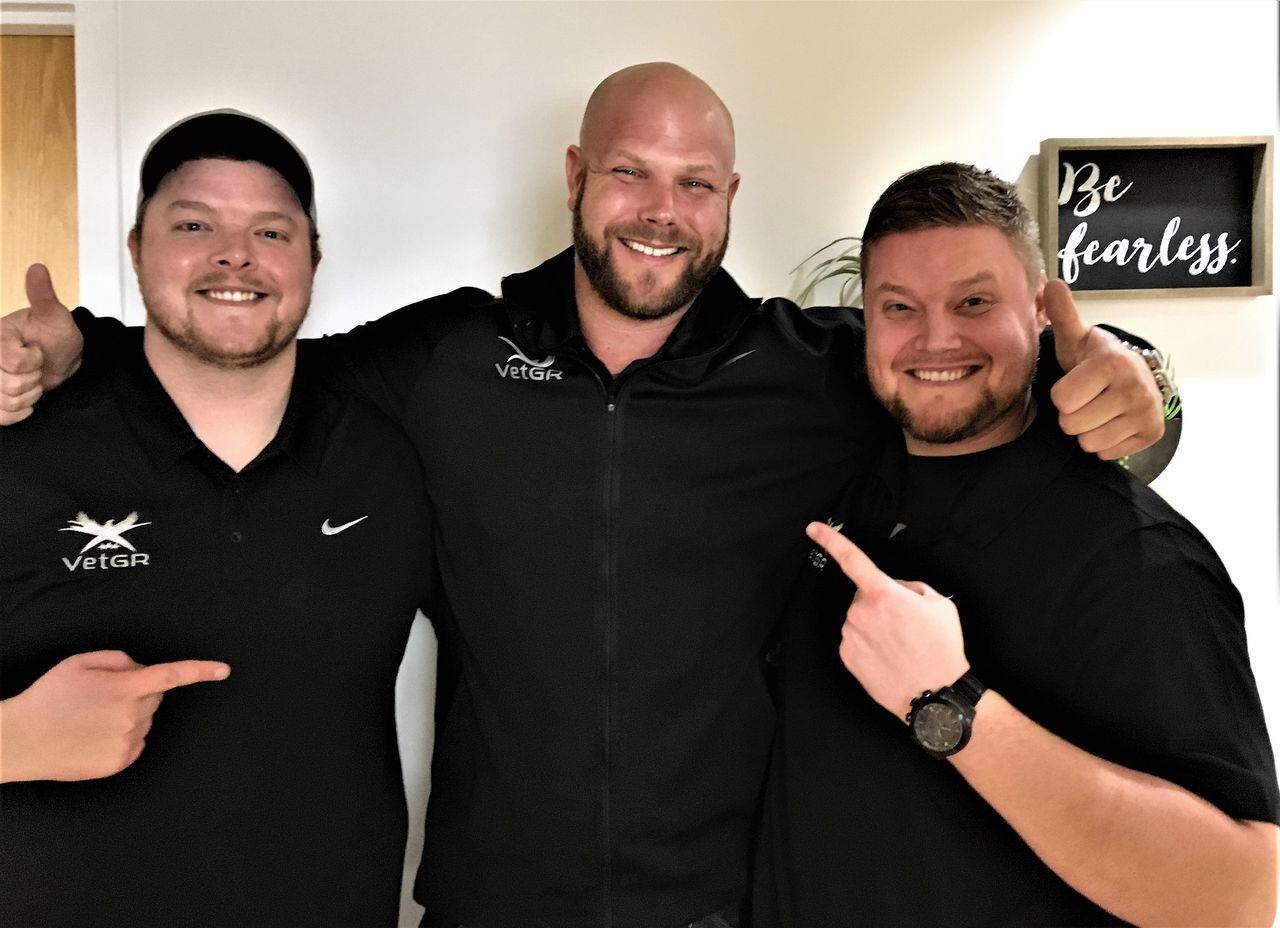 Jesse Johnson-Brower with veterans