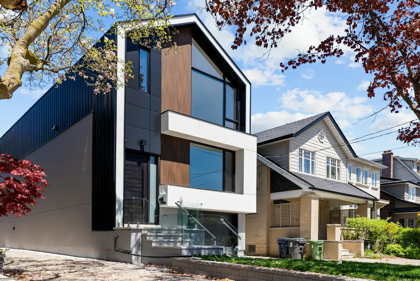 A contemporary infill house standing between older neighbours on a San Francisco street.
