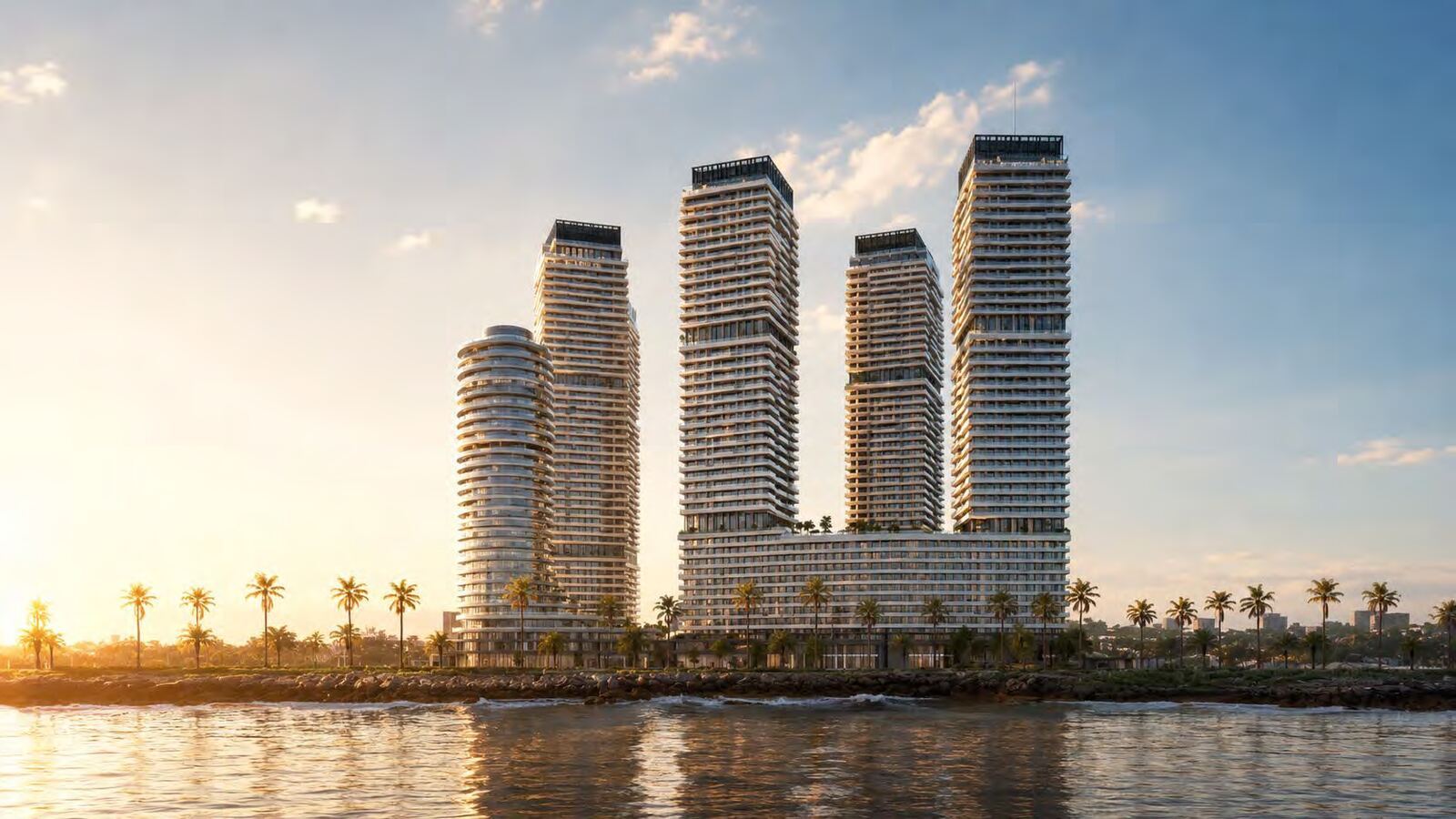Torres CORALIA vistas desde el malecón al atardecer