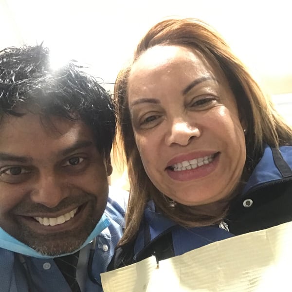 Patient smile after dental implant treatment