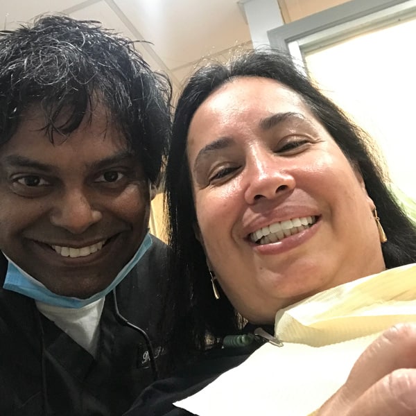 Patient smile after dental implant treatment
