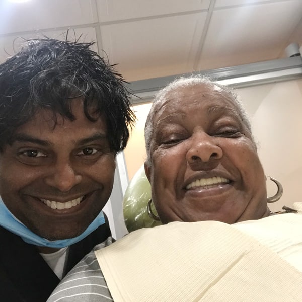 Patient smile after dental implant treatment
