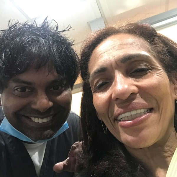 Patient smile after dental implant treatment