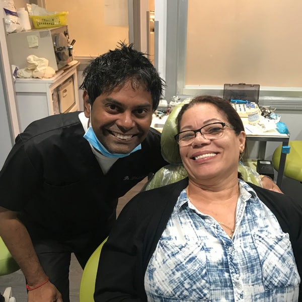 Patient smile after dental implant treatment
