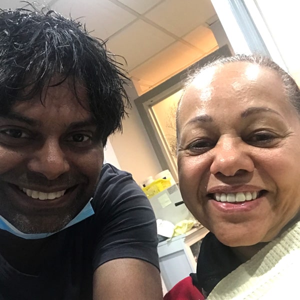 Patient smile after dental implant treatment