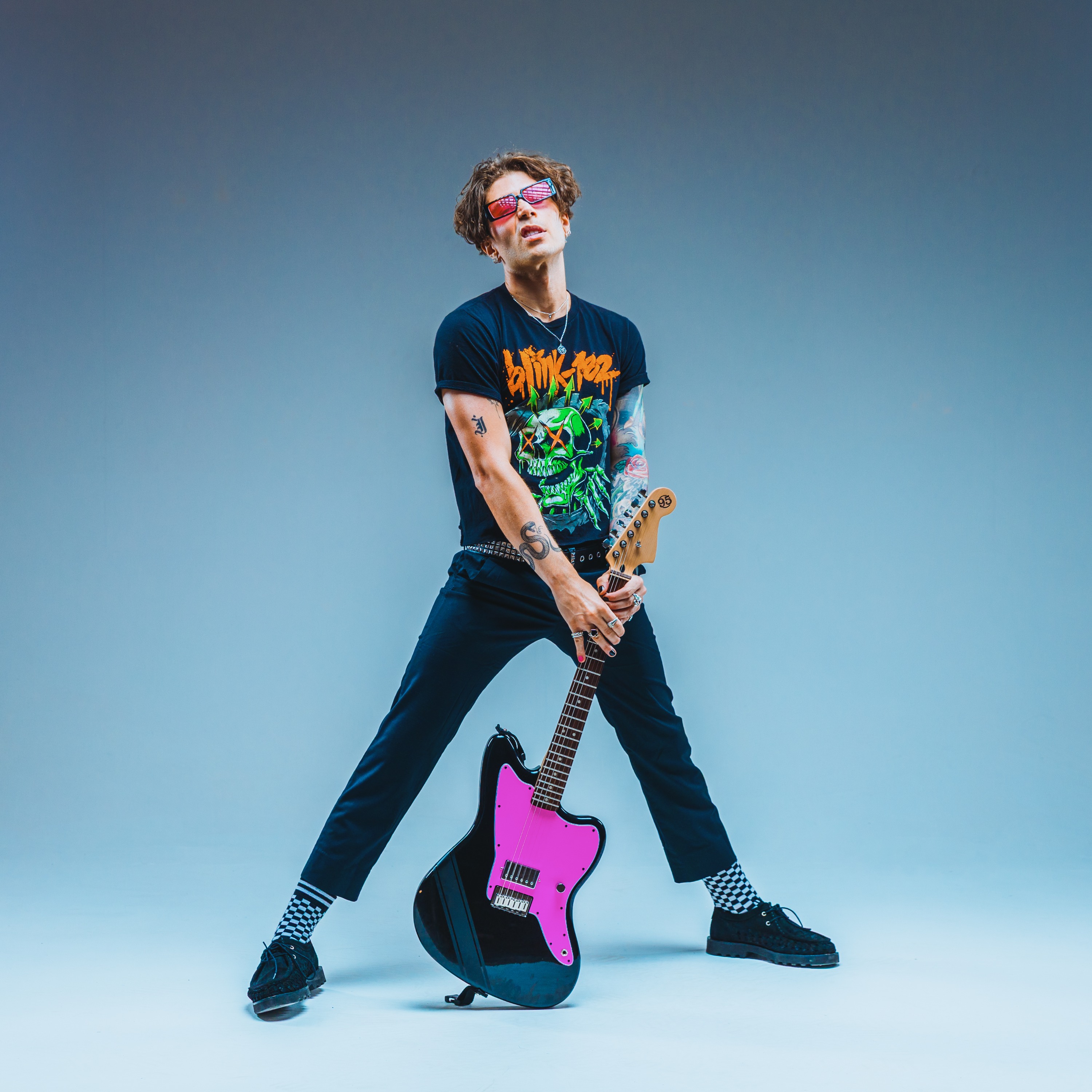 Danny with his pink electric guitar