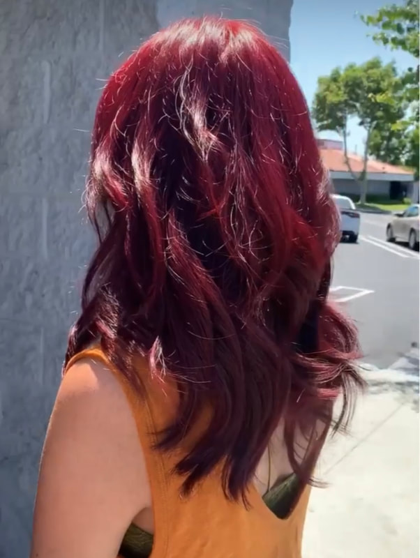 Red-toned waves photographed outdoors.