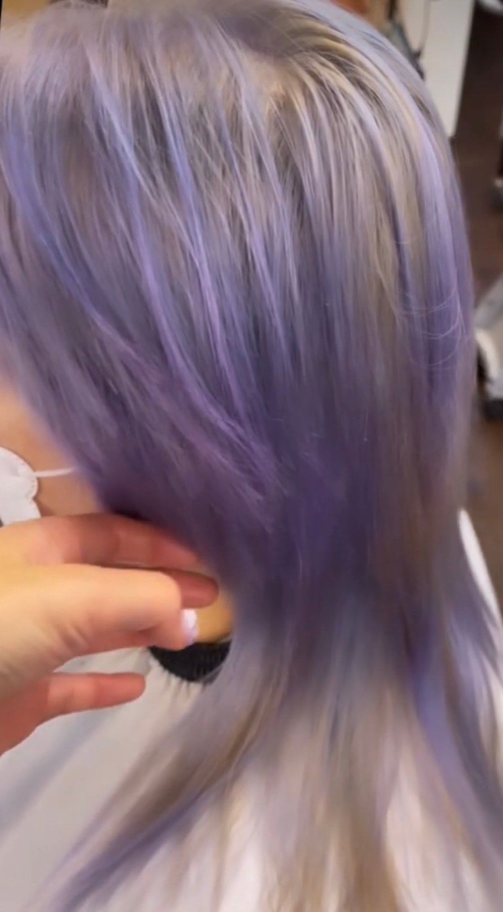 Lilac-toned hair close-up.