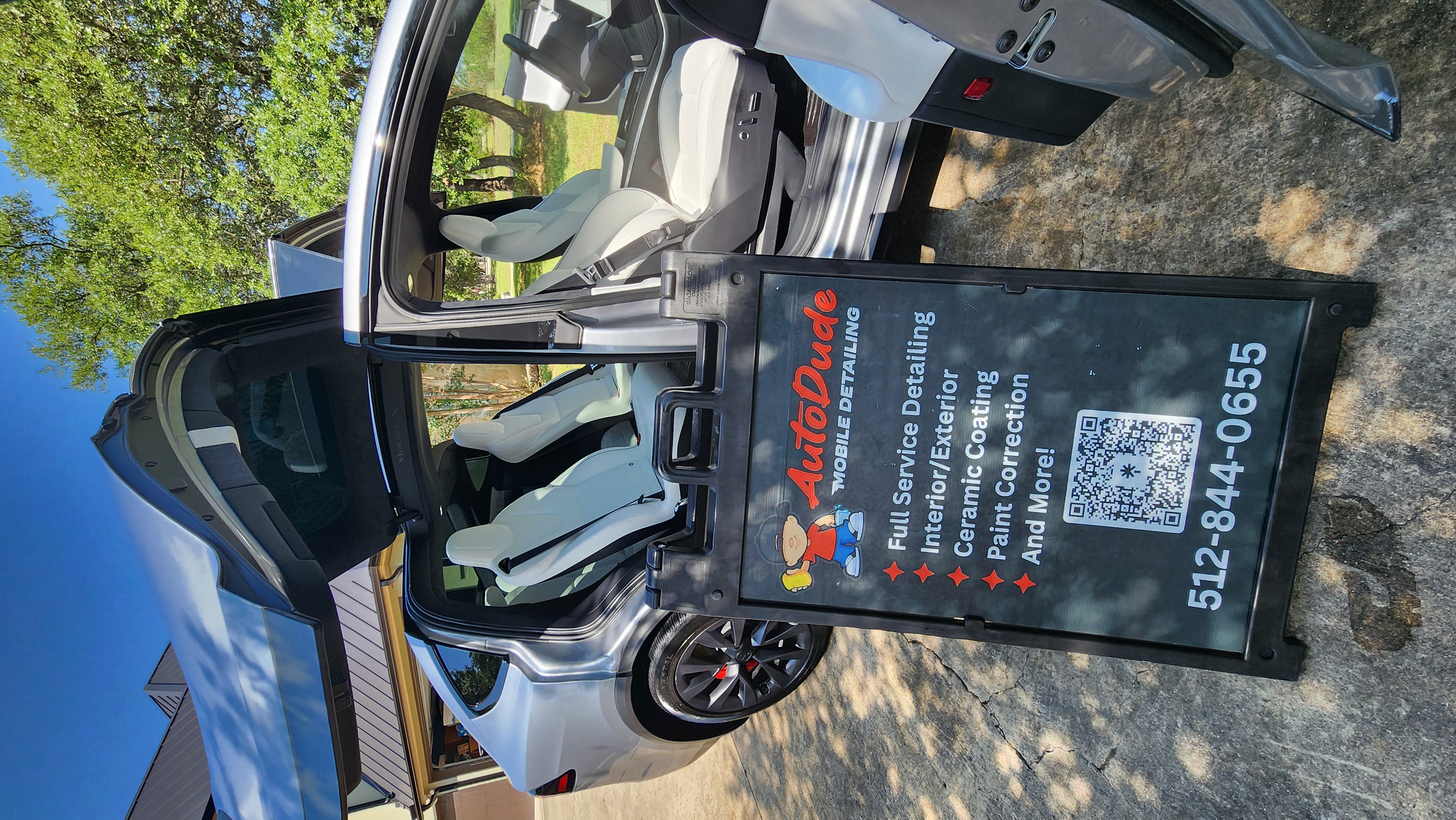 Clean white vehicle interior after an Auto Dude interior detail