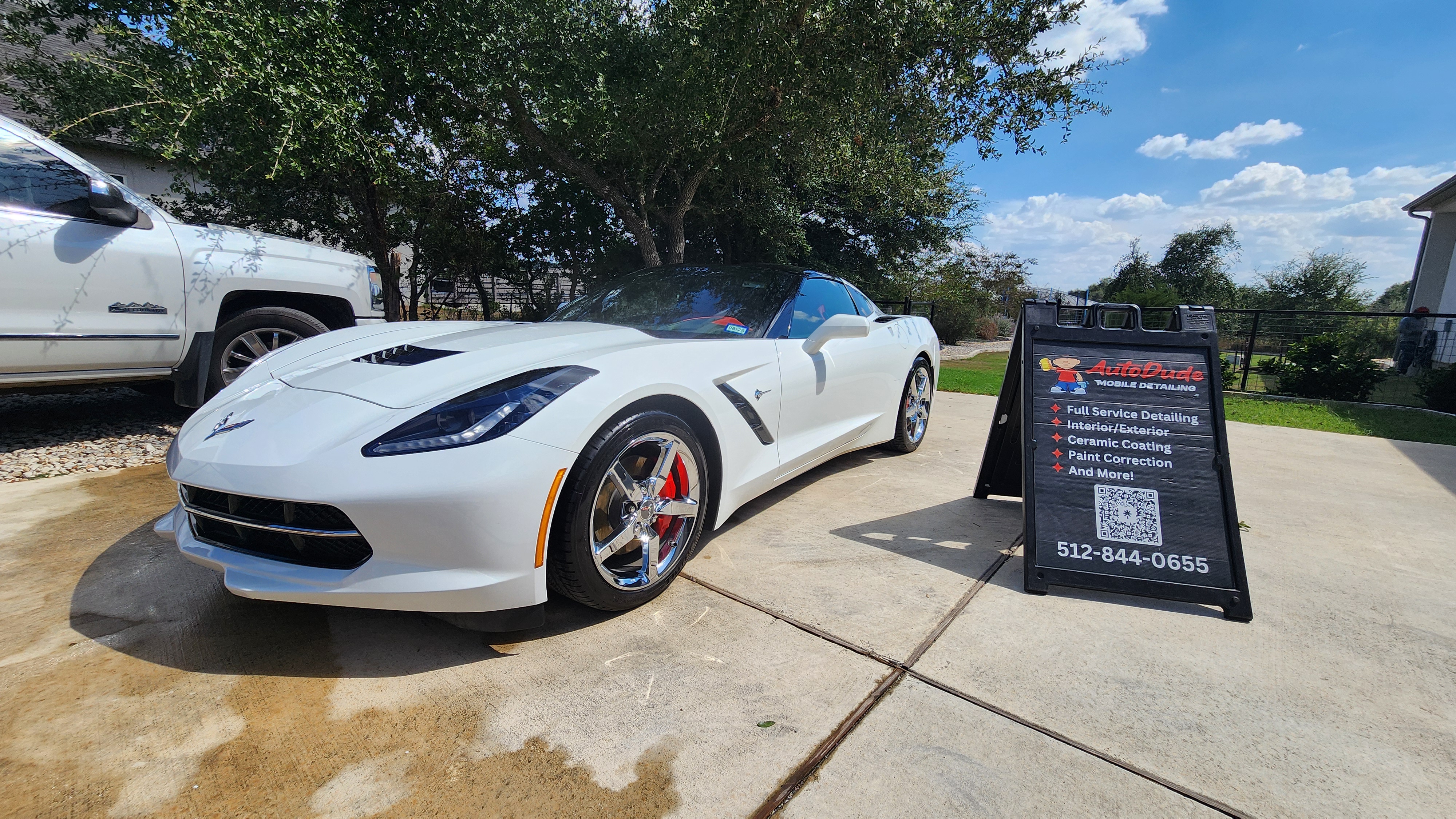 Water beading on ceramic coated car surface showing strong hydrophobic properties