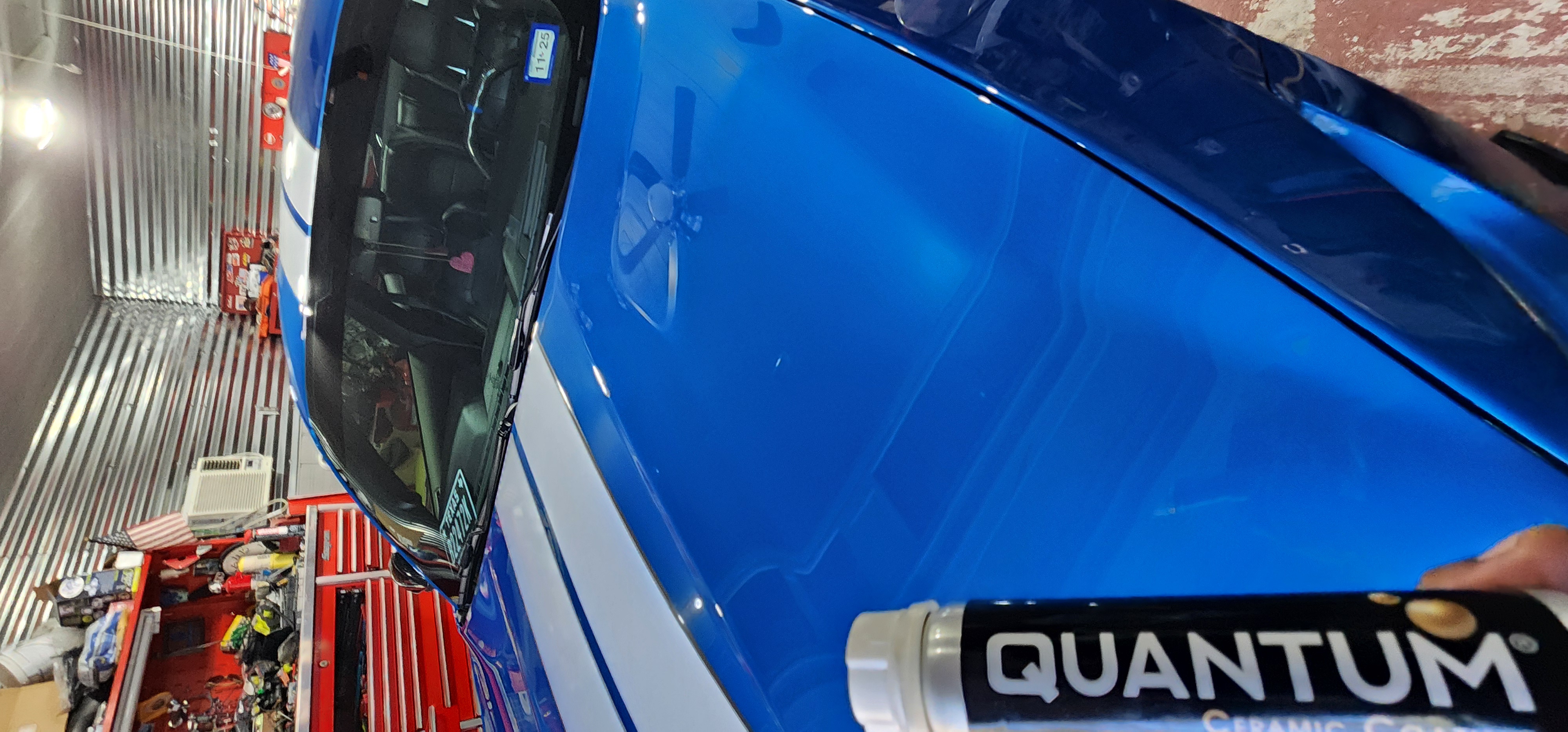 Paint correction removing swirl marks and restoring gloss