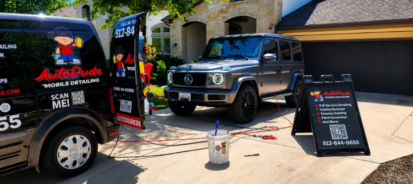 Auto Dude mobile detailing van and Mercedes G-Class during an exterior detail in a New Braunfels driveway