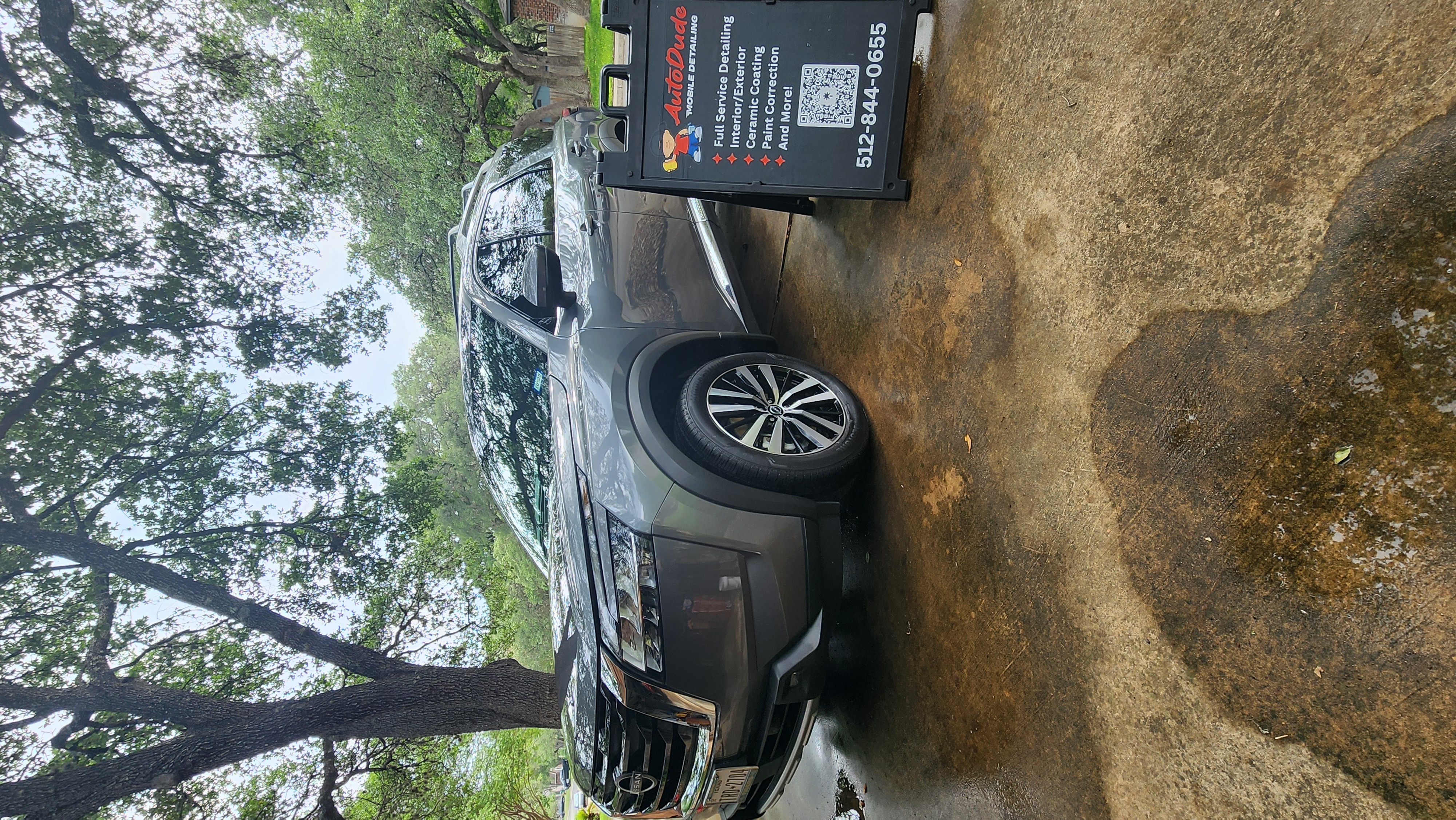 Gray Nissan SUV clean and glossy after Auto Dude detailing