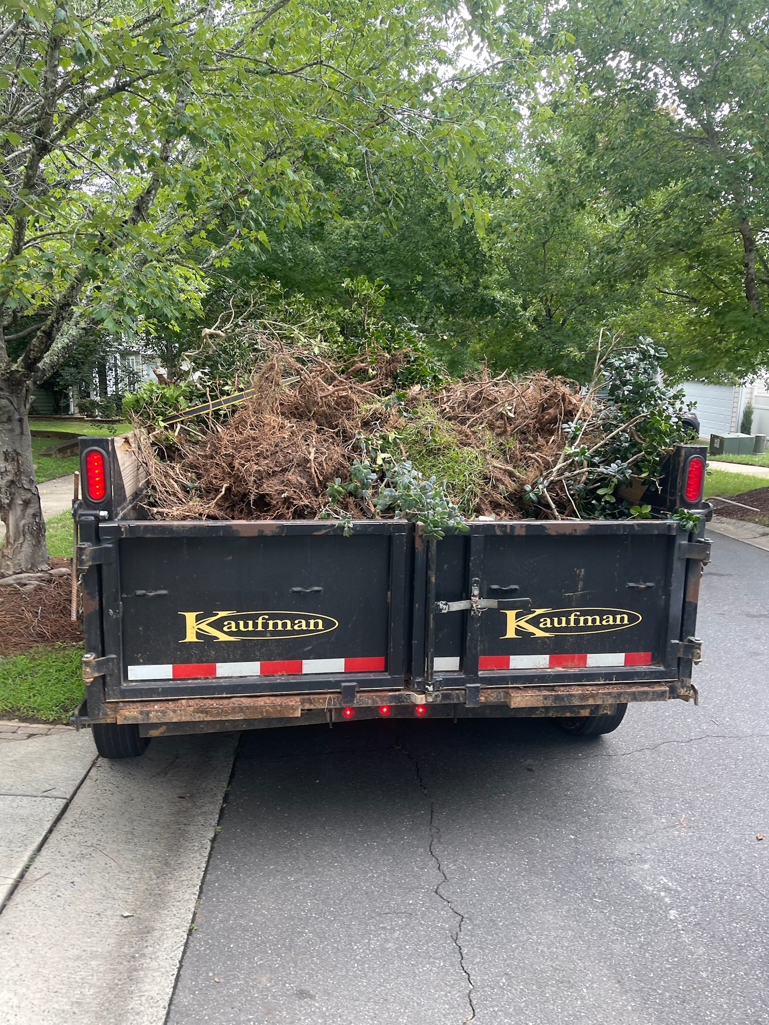 How Adams Equipment Rentals Handles Dump Trailer for Trees