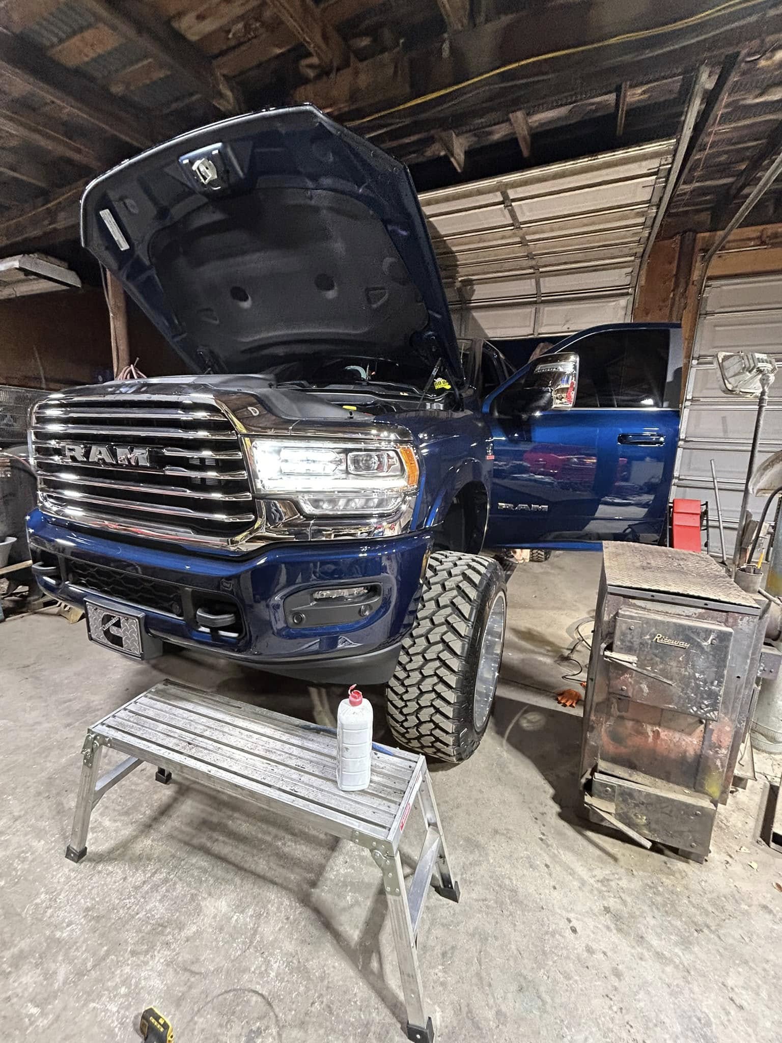 A blue Ram pickup outdoors.