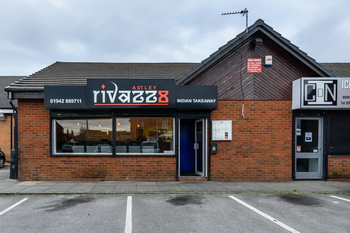 Rivazz8 Indian Takeaway Astley kitchen and dish prep
