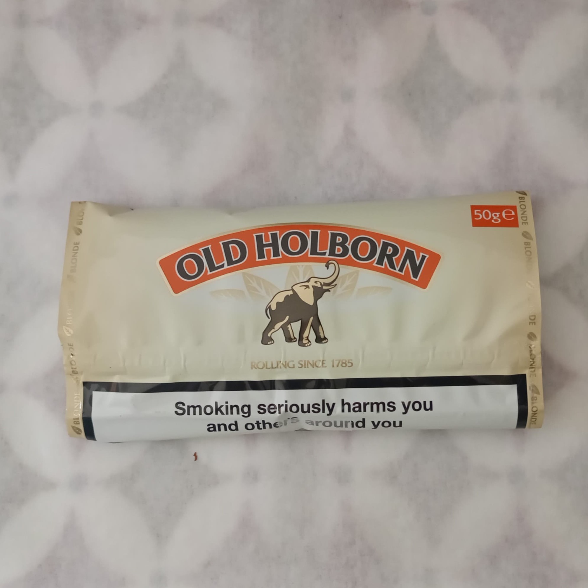 Old Holborn White tobacco pouch with health warning on the pack