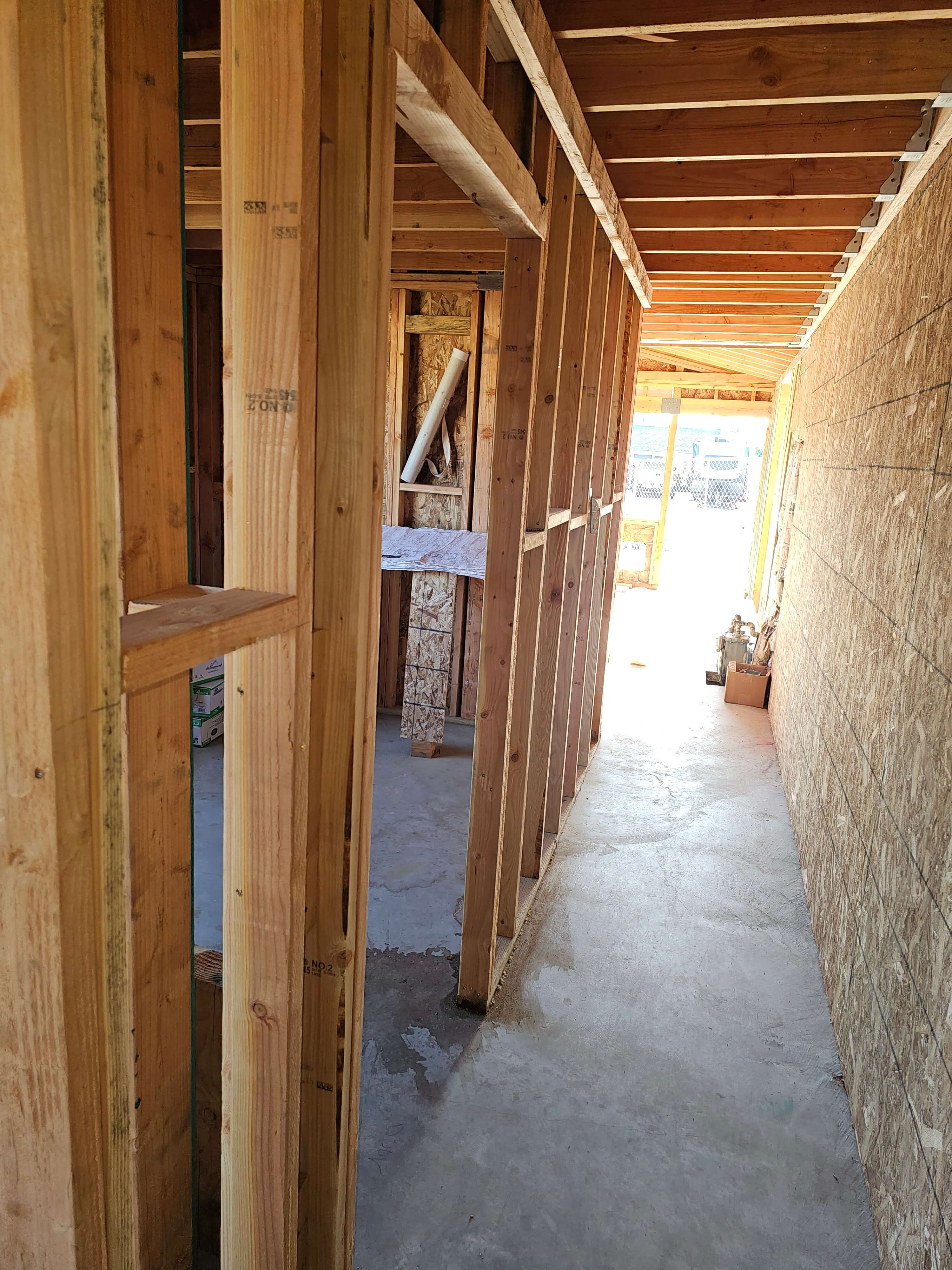 Ontario — framed hallways and rooms, ceiling joists visible